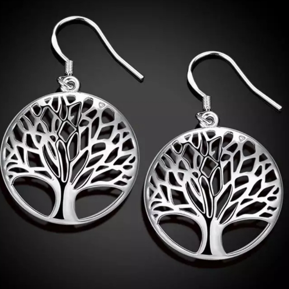 Silver-plated Tree of Life earrings.